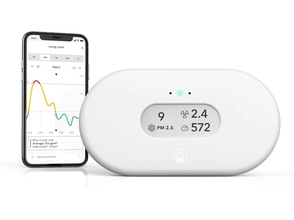 Airthings 2960 View Plus air quality monitor beside the mobile app